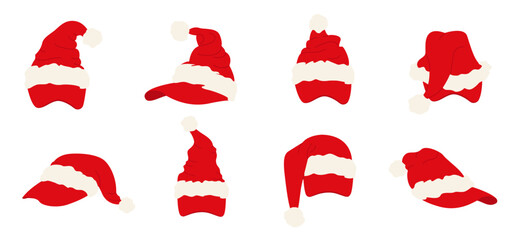 A set of red Santa hats with sun visors on a white background. Festive Christmas headwear with white fur trim and a pom-pom of various shapes. A traditional Christmas element.