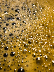 Coffee foam extreme close-up texture background