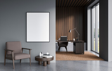Blank poster mockup on clean grey wall in stylish office interior with modern furniture, soft lighting, wooden accents and bright window. 3D Rendering