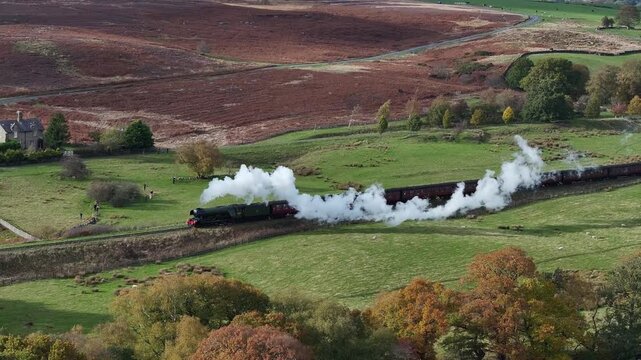 Aerial Video Flying Scotsman on North York Moors Railway.The North Yorkshire Moors Railway (NYMR) showing Flying Scotsman, NYMR heritage railway in North Yorkshire, England,