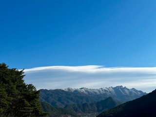 Fototapeta premium clouds over the mountains