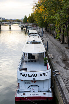 Paris, France, October 22, 2025 - High angle view of the Bateau Ivre excursion boat - named after the famous 1871 poem by Arthur Rimbaud&nbsp;- moored in the Seine River