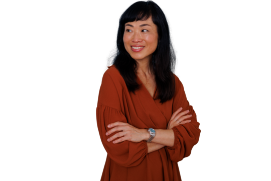 Asian businesswoman smiling with arms crossed, looking away, confident professional portrait, transparent background - Powered by Adobe