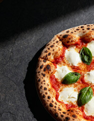 Delicious Margherita pizza with fresh basil and melted mozzarella cheese, perfectly baked with a crispy crust and vibrant tomato sauce