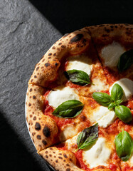 Indulge in a mouthwatering Margherita pizza masterpiece, featuring fresh mozzarella, vibrant tomato sauce, and aromatic basil, perfect for culinary inspiration.