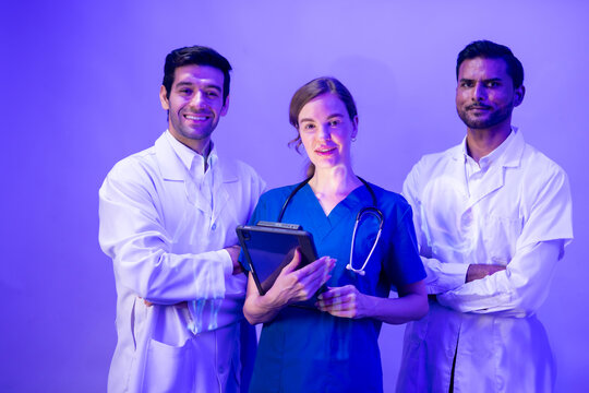 tablet mockup on screen for advertising. Portrait of Professional Healthcare staff Team. Male and female Doctor and nurses medicals staff. Professional successful teamwork and Unity - Powered by Adobe