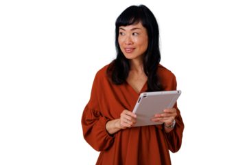 Asian woman smiling, holding digital tablet, looking away, working, communicating with technology, transparent background
