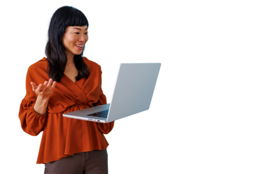 Asian woman smiling, using a laptop, and gesturing during an online video conference, connecting virtually. Transparent background