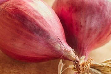 A bunch of raw, whole, red onions