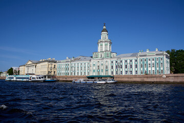 view of the neva river with a historical building in the background 