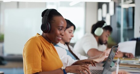Woman, students and headphones with laptop in library for education, studying and listening to music. People, coworking and streaming podcast with digital, online learning and research for assignment - Powered by Adobe