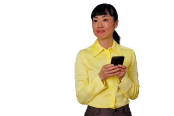 Asian businesswoman using smartphone with transparent background, looking away while engaged in communication