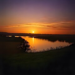 Obraz premium The image of a sunset over a body of water beautiful natural beauty scene 