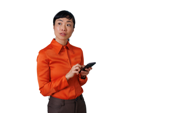 Asian woman looking away while holding smartphone, thinking, contemplating idea, transparent background