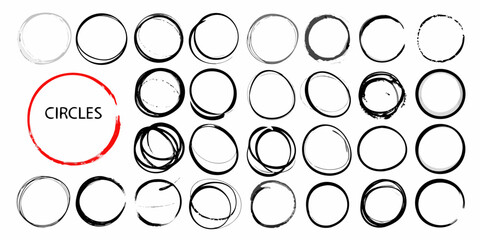 Collection of diverse hand drawn circular shapes and sketches in black and white with one red circle