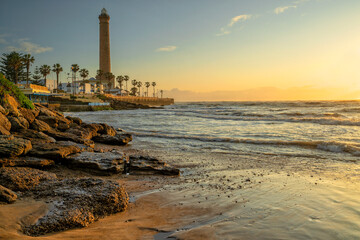 Fototapeta premium Chipiona, Spain. Chipiona Lighthouse on the Ocean Shore. Sea travel and tourism, Atlantic 