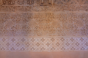 Decoration on walls of Nasrid palace in Alhambra, Granada, Spain
