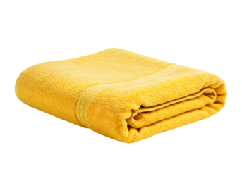 Soft yellow towel folded neatly for spa or bathroom