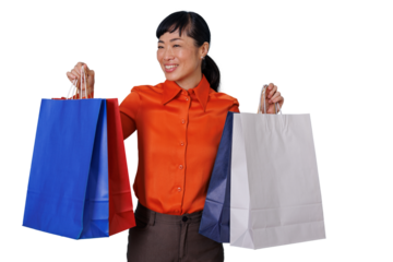 Happy asian woman shopping, holding multiple colorful shopping bags, enjoying consumerism and sales, transparent background