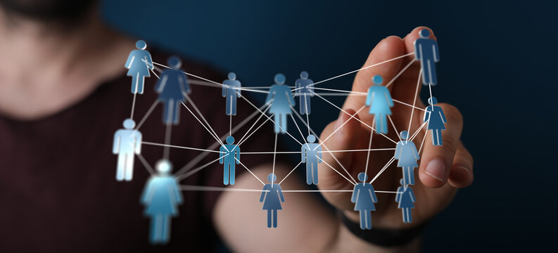 Hand touching digital interface, showing connection of people. Representing communication, business, teamwork,