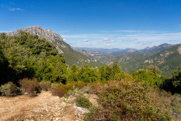 Sardinia (Italy): Trekking from the Silana Pass, 700 meters down towards the Su Gorropu Gorge. Views of the surrounding peaks and nature