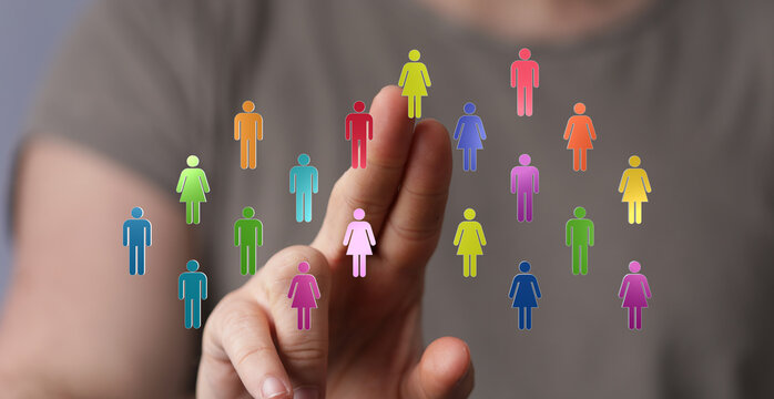 Hand interacting with digital people icons. Representing connections, communities, and digital interaction in an innovative world. - Powered by Adobe