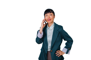 Asian businesswoman talking on a mobile phone, discussing business matters, making a connection, and staying in touch