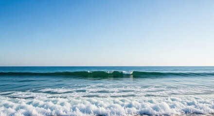 Vast Blue Ocean Waves with Clear Sky Background for Serene Travel and Relaxation