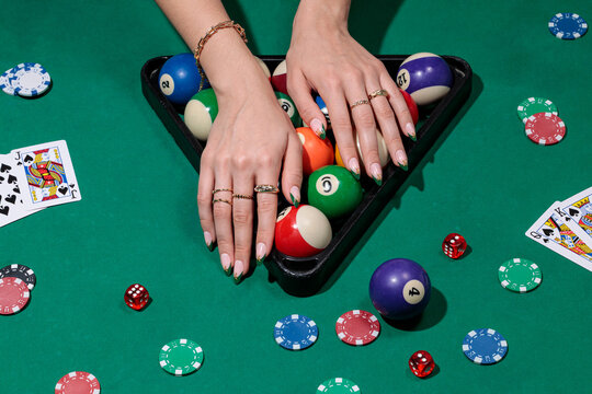 green poker table, hands playing cards, casino, billiard - Powered by Adobe