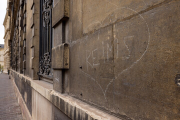 Reims, Marne, Grand-Est, France, August, 28th, 2025, Champagne Area, Urban love graffiti, Nostalgic cityscape with secret messages, Street scene featuring heartfelt graffiti and aged