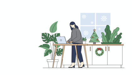 Busy woman working remotely on laptop in a cozy holiday home office with festive decorations
