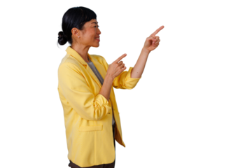 Asian businesswoman smiling, pointing both index fingers, showing direction or presenting information on a transparent background