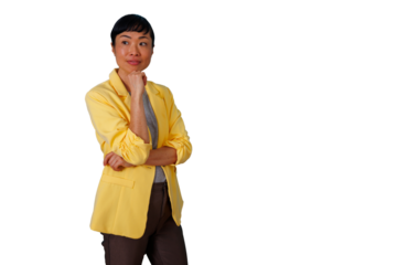 Asian businesswoman in yellow blazer thinking, looking away, contemplating business ideas, transparent background