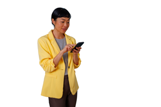Woman in yellow jacket using smartphone for communication, scrolling and browsing technology, transparent background