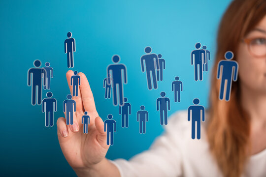 Businesswoman interacting with people icons. Concept of connection, community, human resources and networking.