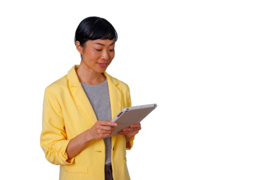 Asian businesswoman using digital tablet, engaging with technology, working remotely, transparent background for easy integration - Powered by Adobe