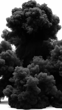 Dramatic high-contrast burst of turbulent dark gray smoke erupting violently and aggressively filling the blank isolated background space texture, aggressively, filling