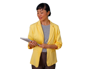 Asian business woman in yellow blazer holding a tablet, managing corporate tasks, transparent background