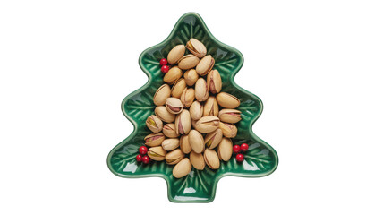 Festive green christmas tree shaped dish filled with delicious pistachios and small red berry decorations isolated on transparent background