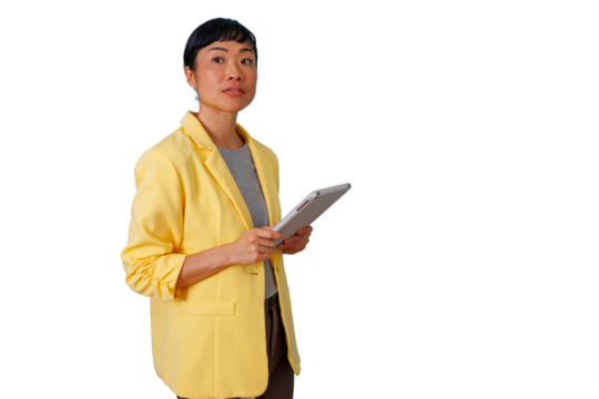 Asian businesswoman in yellow blazer using digital tablet for modern business and technology, transparent background - Powered by Adobe