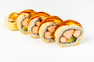 Colorful sushi rolls are neatly arranged, featuring fresh salmon and creamy avocado, enticing all
