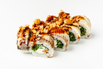 Sushi rolls filled with fresh ingredients are beautifully presented with a crunchy peanut topping