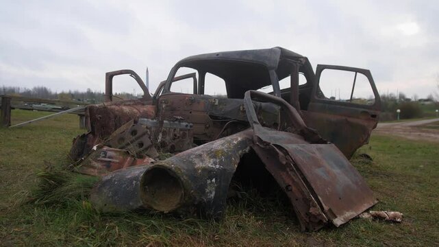 degenerated automotive inside view, corroded vehicle interior featuring loose and damaged parts, worn and abandoned car interior showing corrosion and scattered vehicle components