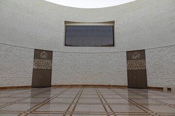 A stunning view of Al Irfan Mosque in Muscat, Oman, showcasing modern Islamic architecture and...
