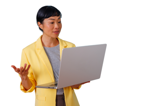 Asian businesswoman presenting, holding laptop and gesturing, explaining during a virtual meeting with transparent background