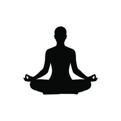 Silhouette of a person meditating in a lotus pose