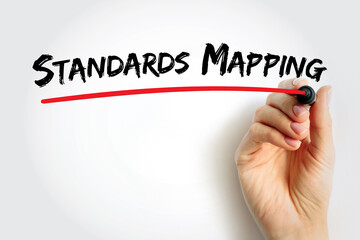 Standards Mapping handwritten with marker by hand, concept of aligning goals and educational or professional criteria with artificial intelligence planning