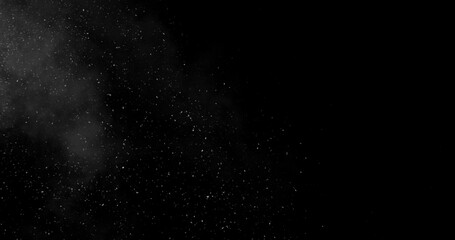 Falling snowflakes with fog. isolated on black background. Winter snow overlay texture for VFX, compositing, motion graphics and atmospheric effects