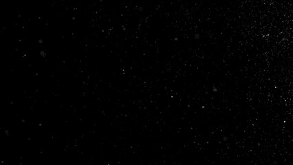Falling snowflakes isolated on black background. Winter snow overlay texture for VFX, compositing, motion graphics and atmospheric effects