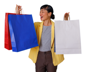 Smiling woman holding colorful shopping bags after successful retail therapy, enjoying sale purchases, isolated on transparent background